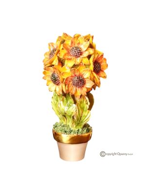 Planta artística de cerámica decorada con girasoles y detalles dorados, realizada totalmente a mano.